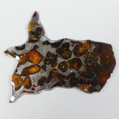 an image of a piece of metal with a cow head on it