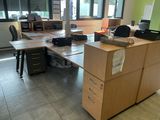 an image of an office with a lot of desk space
