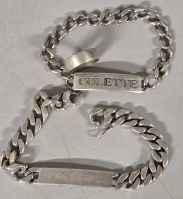 a silver bracelet and a bracelet with a name on it