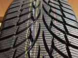 a close up of a tire with a yellow line on it