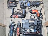 a lot of tools that are laying out on the floor
