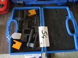 a blue case with tools inside of it on the floor