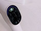 a white device that is sitting on top of a table