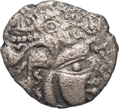 une pièce de monnaie en argent portant l'image d'un visage d'homme