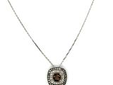 a necklace with a square shaped brown and white diamond pendant