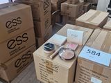 many boxes of cosmetics on display in a store window