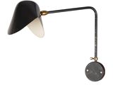 a black and gold desk lamp with a black shade