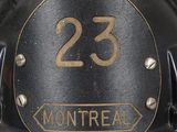 a fireman ' s helmet with the number 23 on it
