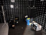 a photo of a room with a lot of items on the floor