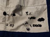 a picture of a piece of cloth with black and white images on it
