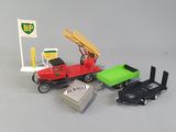 a small toy truck with a crane on top of it