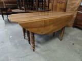 a table that is sitting in the middle of a room