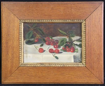 une peinture à l'huile de cerises et de feuilles sur une nappe