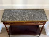 an image of a marble topped table with a drawer underneath it