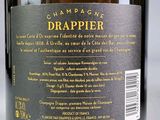 a label on a bottle of wine on a table
