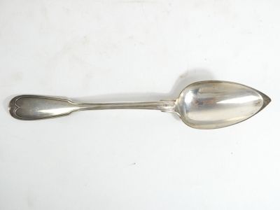 a spoon that is sitting on a table