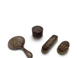 three wooden brushes and a brush on a white surface