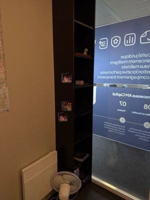 an image of a room with a fan in it