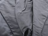 an image of a woman ' s jacket and tie on a mannequin mannequin