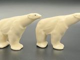 pair of white ceramic polar bear salt and pepper shakers