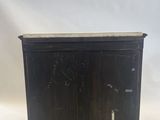 a black cabinet with a door and a drawer on it