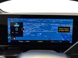 a picture of a car dashboard with a gps screen