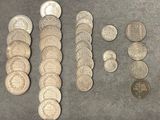 a lot of coins that are sitting on a table
