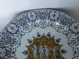 a plate with a picture of a man and a woman on it