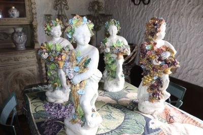 a table with a bunch of figurines on top of it