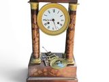 a clock that is sitting on top of a table