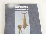 a book with a picture of a man standing next to a shark