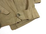 the jacket is tan and has buttons on the collar