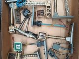 a cardboard box filled with assorted construction tools