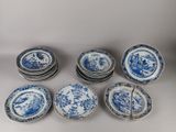 six blue and white plates with blue and white designs on them