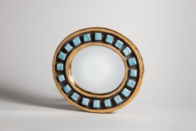 an image of a gold and blue ring