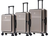 trois bagages empilés les uns sur les autres, montés sur roulettes