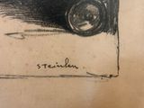 drawing of a black and white photo of a camera on a piece of paper