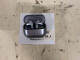 a box with a pair of earphones in it