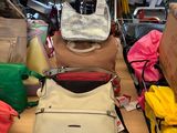 many bags on the table in the store