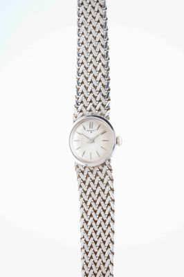 an image of a woman ' s wrist watch on a white background