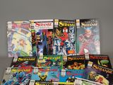 a lot of comic books sitting on a table