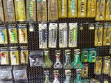 many different types of toothbrushes on display in a store