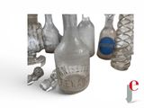 many bottles that are sitting next to each other on a table