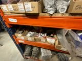 many boxes of assorted items on a shelf in a store