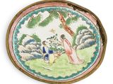 a picture of a decorative plate with a woman and a child