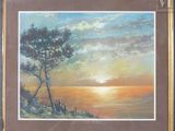 tableau représentant un coucher de soleil sur l'océan, avec un arbre au premier plan