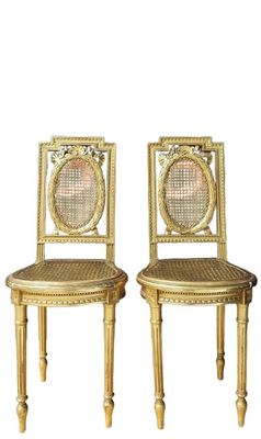 Paire de chaises bois doré et cannage style Louis XVI (haute…