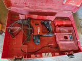 an image of a red tool box with tools inside of it