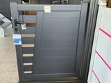 a door that is open in a room with wood flooring
