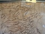 a drawing on the glass of a window of a store